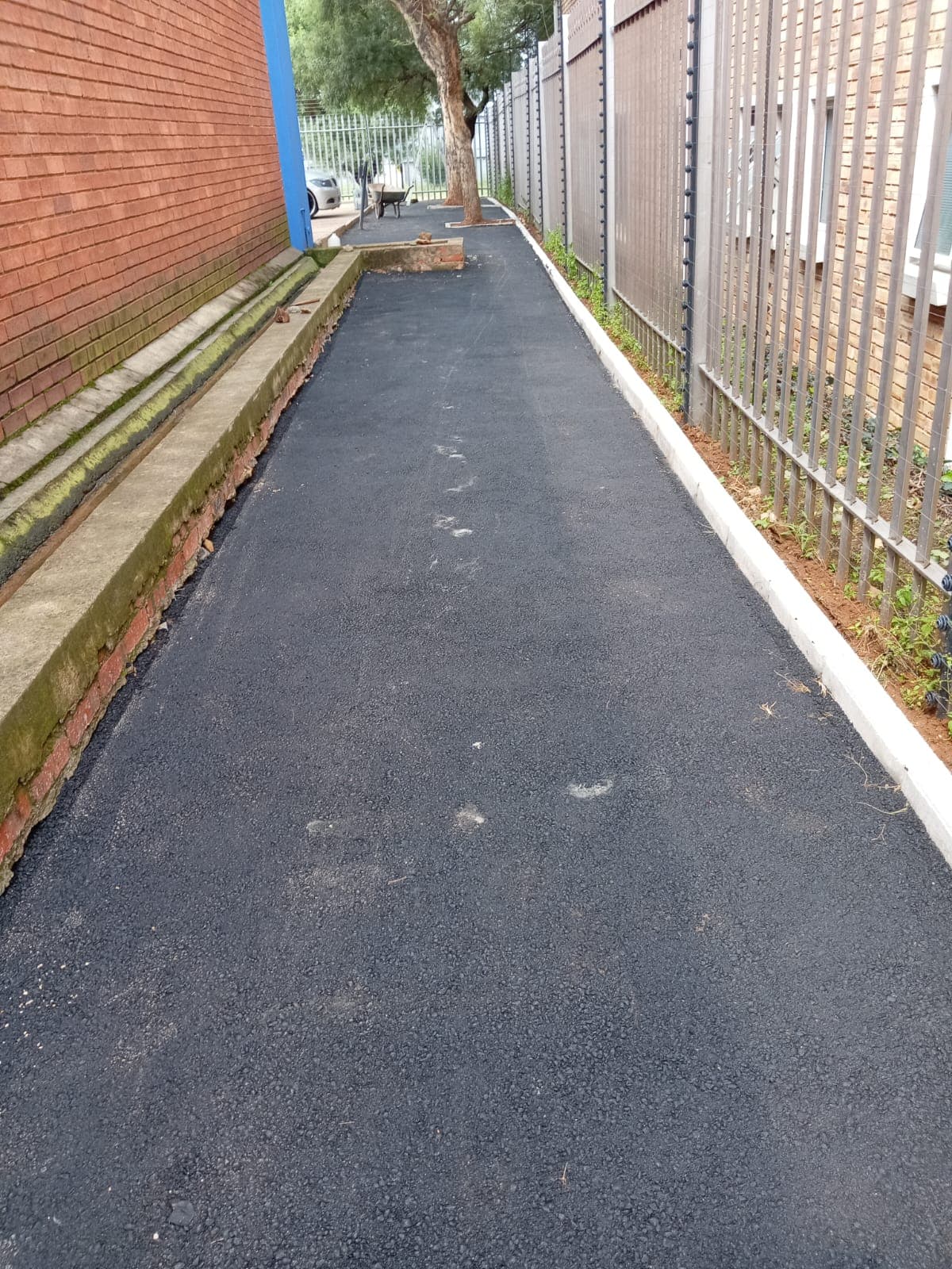 Tar walkway with smooth professional finish