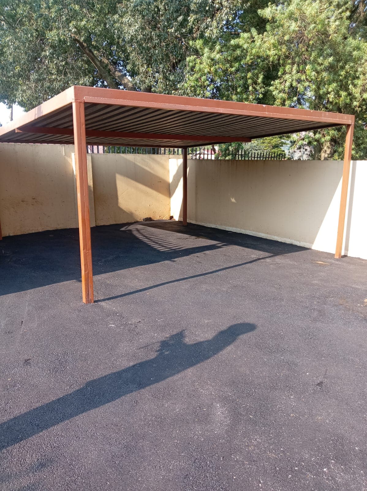 Residential parking area with tar surfacing